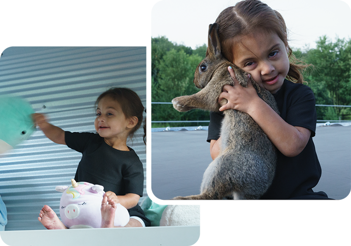 Elena playing with toys and with her pet bunny, Flopsy.